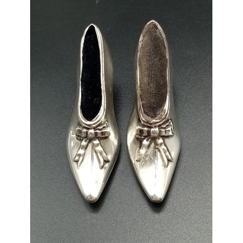 226 - Victorian silver set of a swan and a pair of shoes cushion pins , total weight 93.7g