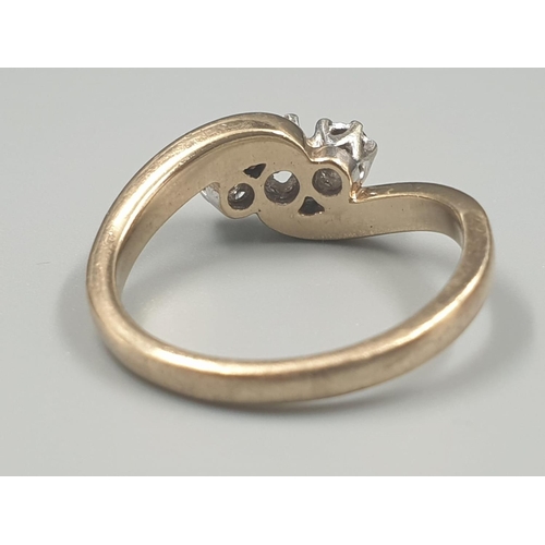 398 - 9K YELLOW GOLD VINTAGE 3 STONE DIAMOND TWIST RING APPROX 0.10CT DIAMONDS WEIGHT 3G SIZE L1/2