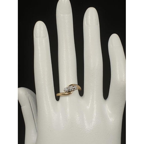 398 - 9K YELLOW GOLD VINTAGE 3 STONE DIAMOND TWIST RING APPROX 0.10CT DIAMONDS WEIGHT 3G SIZE L1/2