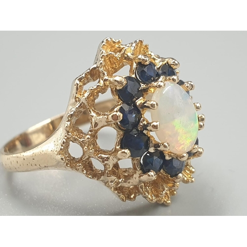 236 - 9K YELLOW GOLD OPAL & SAPPHIRE CLUSTER RING WEIGHT 5.2G SIZE O