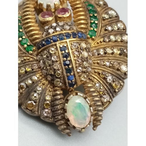 12 - A Rare Egyptian Revival Scarab Brooch with Fire Opal, Emerald, Sapphires (approx 1.83cts total gemst... 