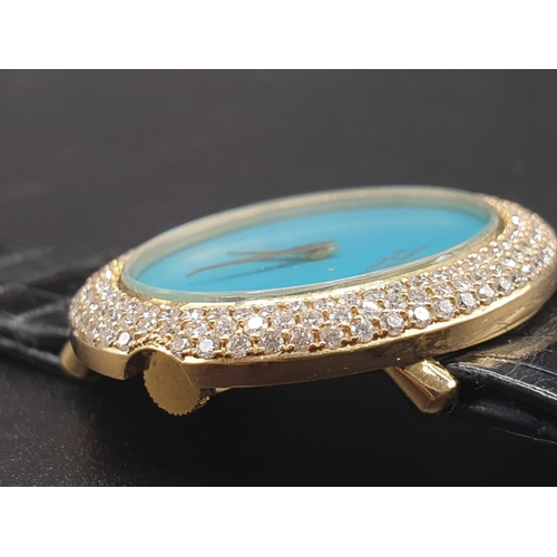 122 - A MONTRE ROYALE OF GENEVA LADIES 18K GOLD DRESS WATCH WITH DIAMOND BEZEL AND TURQUOISE FACE. 36mm