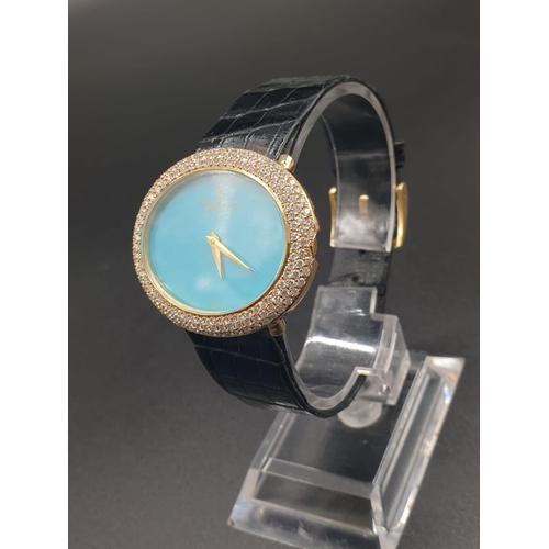 122 - A MONTRE ROYALE OF GENEVA LADIES 18K GOLD DRESS WATCH WITH DIAMOND BEZEL AND TURQUOISE FACE. 36mm