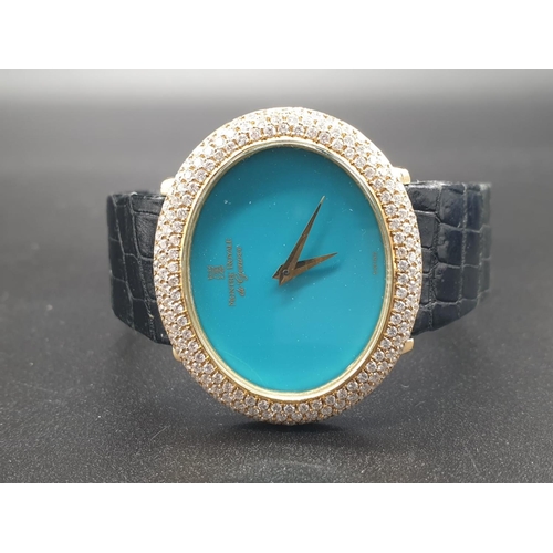 122 - A MONTRE ROYALE OF GENEVA LADIES 18K GOLD DRESS WATCH WITH DIAMOND BEZEL AND TURQUOISE FACE. 36mm