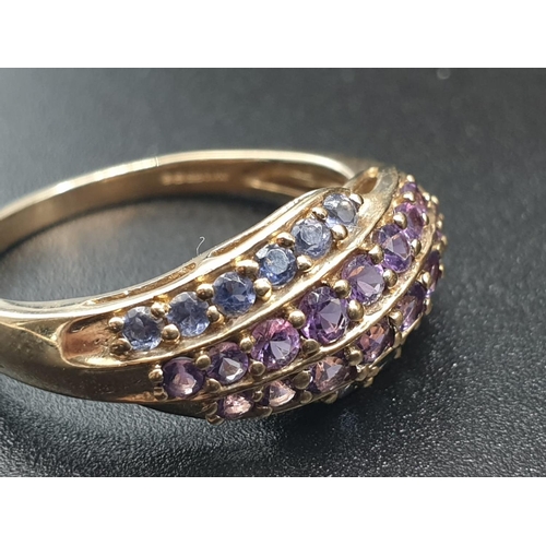 169 - 9K  YELLOW GOLD AMETHYST & IOLITE SET RING WEIGHT 2.8G SIZE R