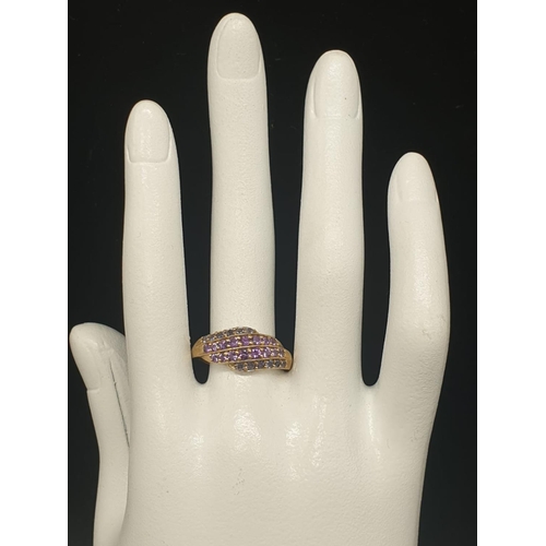 169 - 9K  YELLOW GOLD AMETHYST & IOLITE SET RING WEIGHT 2.8G SIZE R