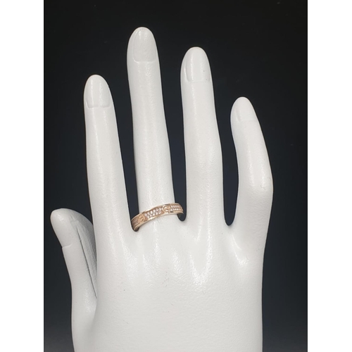 229 - 9K YELLOW GOLD CARTIER STYLE CZ STONE SET RING, WEIGHT 3.3G SIZE N