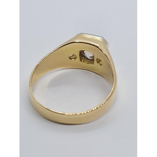 249 - A GENTLEMANS 18K YELLOW GOLD RING WITH 1.5CT DIAMONDS.
7.6gms and SIZE S