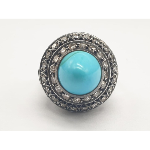 278 - AN ANTIQUE SILVER RING WITH DIAMONDS AND TURQUOISE IN AN ART DECO STYLE.
5.8gms AND SIZE G