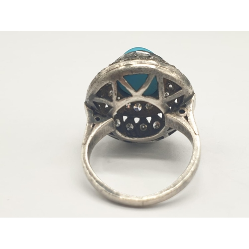 278 - AN ANTIQUE SILVER RING WITH DIAMONDS AND TURQUOISE IN AN ART DECO STYLE.
5.8gms AND SIZE G