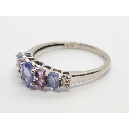 299 - 9K WHITE GOLD DIAMOND, PINK SAPPHIRE AND IOLITE RING WEIGHT 2G SIZE N1/2