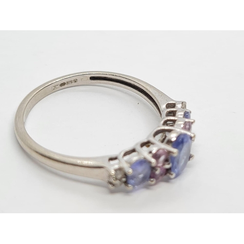 299 - 9K WHITE GOLD DIAMOND, PINK SAPPHIRE AND IOLITE RING WEIGHT 2G SIZE N1/2