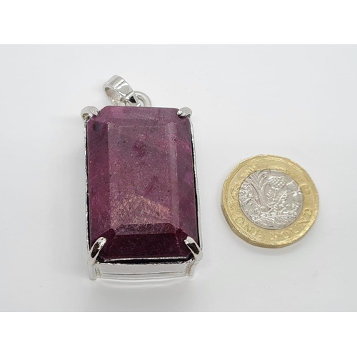 39 - Massive Ruby Gemstone Pendant with a 100ct plus Ruby Stone in 925 Silver, weight 50g and size 5x3.5c... 