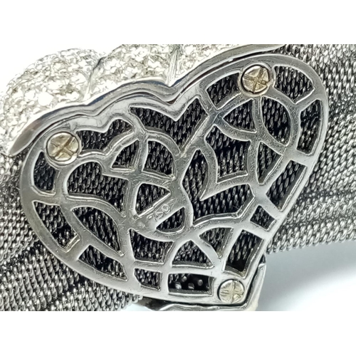 508 - an 18k white gold bracelet with 10 diamonds and a diamond encrusted heart.
53.4gms  19cms