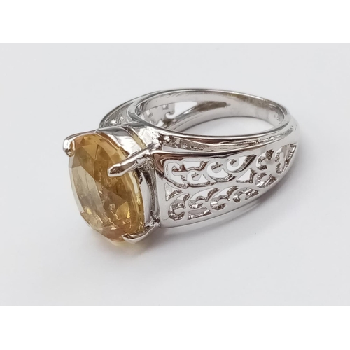 540 - An 11ct citrine sterling silver ring, stamped 925 size U