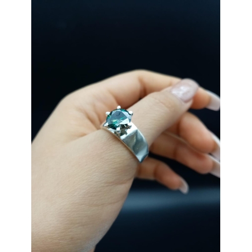 544 - A 2.10ct blue moissanite gemstone ring set in sterling silver, stamped 925 size S