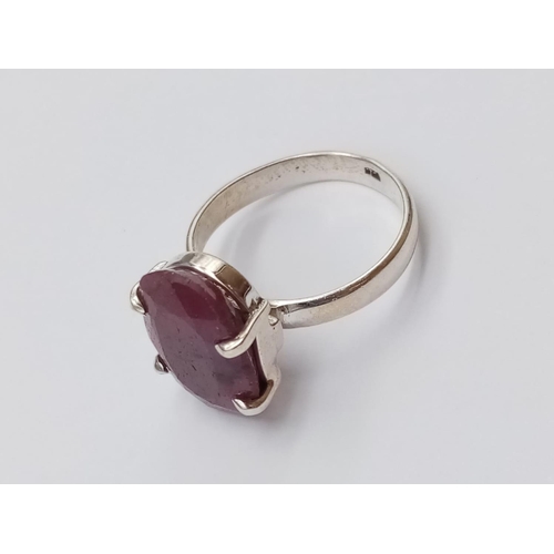 554 - A sterling silver gemstone ring set with 11ct natural red ruby, oval cut, hallmarked, 9g total weigh... 