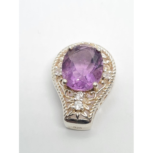 686 - STERLING SILVER WITH LARGE AMETHYST SET PENDANT 2.8G