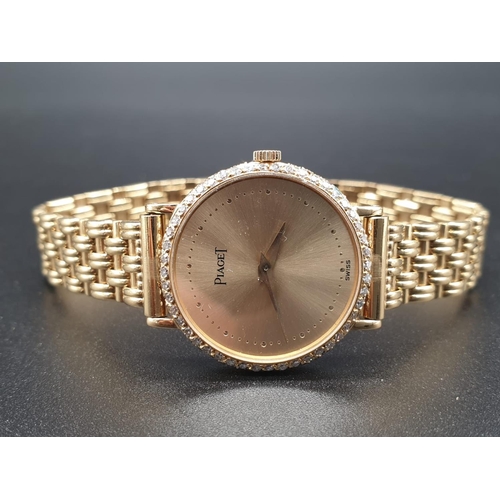 129 - AN 18K GOLD PIAGET LADIES WRIST WATCH WITH DIAMOND BEZEL AND SOLID GOLD STRAP.
manual movement  25mm... 