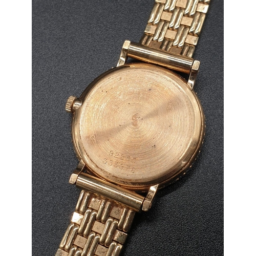 129 - AN 18K GOLD PIAGET LADIES WRIST WATCH WITH DIAMOND BEZEL AND SOLID GOLD STRAP.
manual movement  25mm... 