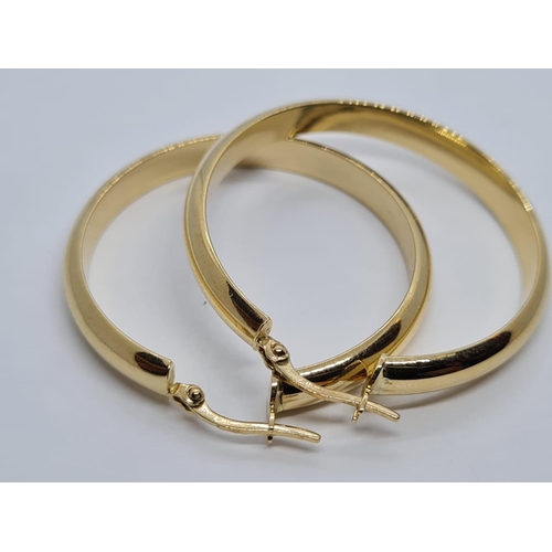 297 - Pair of 16k yellow gold big hoop earrings, weight 4.4G and 38mm diameter approx