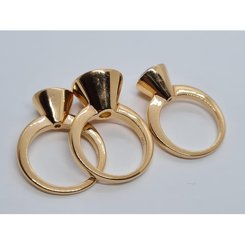 342 - a set of 3 18k yellow gold rings size n with different semi precious coloured stones
26.3gms