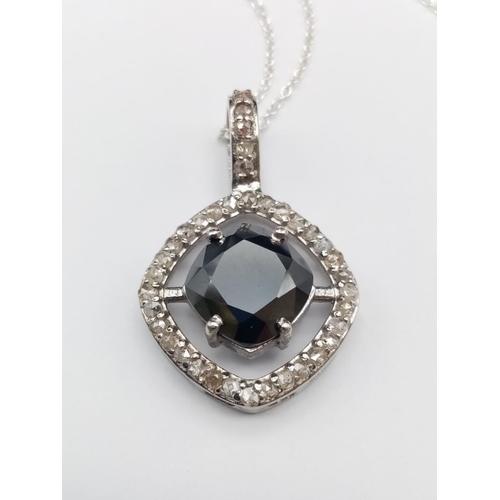 558 - A 4ct black moissanite gemstone pendant surrounded by rose cut diamonds and set in sterling silver, ... 