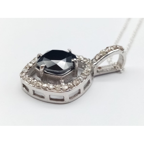 558 - A 4ct black moissanite gemstone pendant surrounded by rose cut diamonds and set in sterling silver, ... 