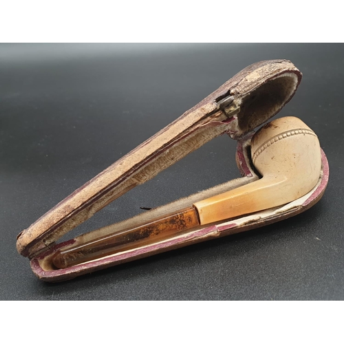 699 - AN ANTIQUE FRENCH PIPE IN ITS ORIGINAL LEATHER CASE . 13cms in length A/F