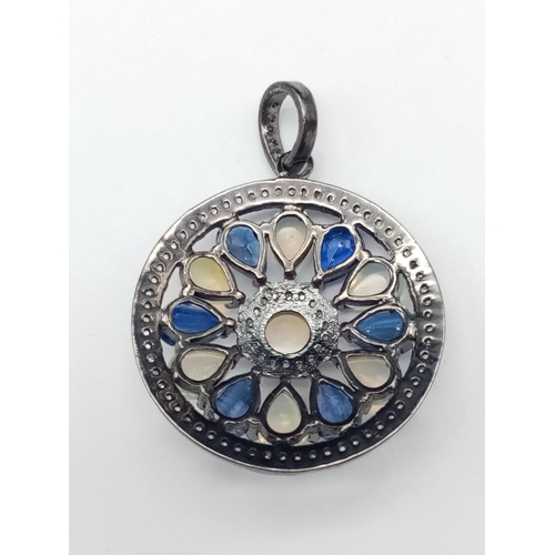 72 - Art Deco Kyanite and Opal Pendant in 925 Silver with diamonds surround. 5.60cts kyanites, 3.40ct opa... 