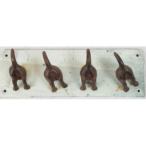 968 - A Humorous Cast Iron on Stone Coat Rack Involving Four Dogs. Perfect for a Pet Lover. 10 x 30cm