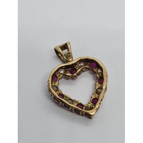 132 - 9K YELLOW GOLD CZ & RUBY HEART PENDANT WEIGHT 1.2G