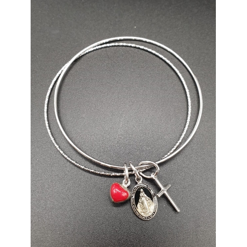 284 - STERLING SILVER DOUBLE BANGLE WITH 3 CHARMS WEIGHT 9.3G AND 7.5CM DIAMETER