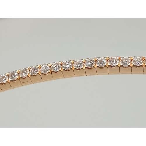 314 - AN  18K ROSE GOLD DIAMOND ENCRUSTED CHOKER NECK PIECE IN SNAKE FORM.
24.2gms approx 38cms long