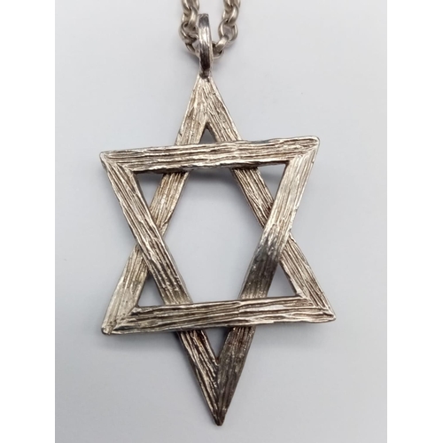 733 - Silver Star of David Necklace and Pendant.
60cm. 25.03g