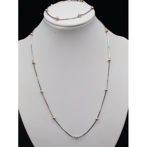 887 - 9ct white and yellow gold ball necklace and matching bracelet, weight 9.9g