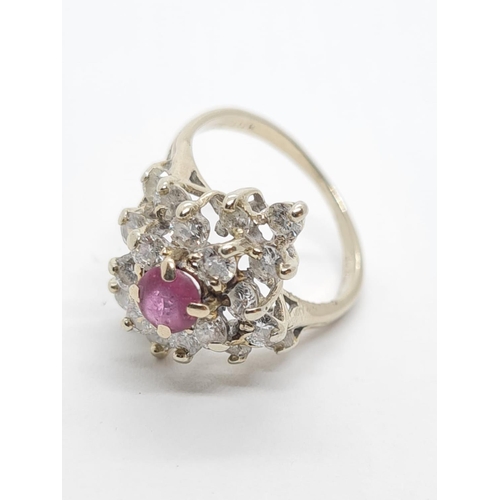 928 - 14ct Gold Ruby and Diamond RING.  2.8g  Size H