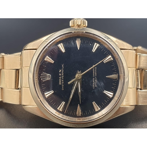 21 - VINTAGE 18CT GOLD ROLEX OYSTER PERPETUAL AUTOMATIC WITH DESIRABLE BLACK FACE 36MM