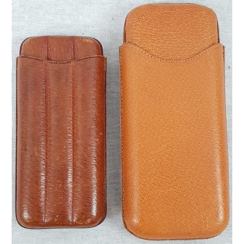 474 - Two Vintage Leather Cigar Cases by Parker of England.
16cm and 14cm.