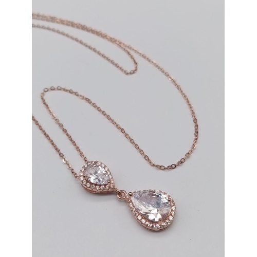 881 - Sterling Silver Rose Gold and Stone Set Pendant on 18