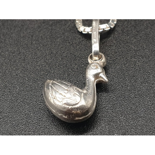 318 - STERLING SILVER BOX CHAIN WITH DUCK PENDANT, WEIGHT 4.7G AND 42CM LONG CHAIN