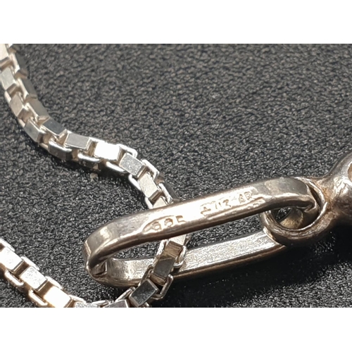 318 - STERLING SILVER BOX CHAIN WITH DUCK PENDANT, WEIGHT 4.7G AND 42CM LONG CHAIN