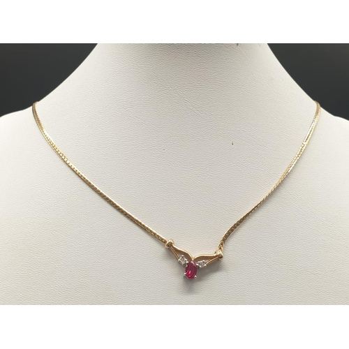 230 - 9K YELLOW GOLD SET WITH DIAMOND AND RED STONE NECKLACE, WEIGHT 6G AND 40CM LONG APPROZ