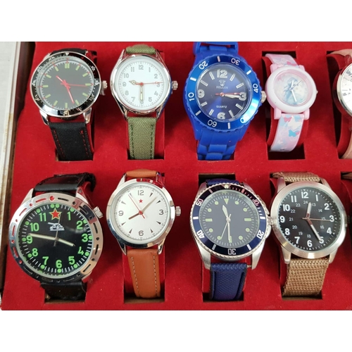 355 - An Assortment of 24 Gents and Ladies watches in a tartan decorated metal case. 8 spare straps. Every... 