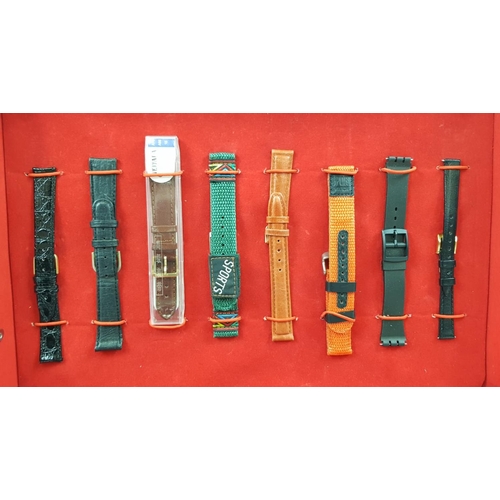 355 - An Assortment of 24 Gents and Ladies watches in a tartan decorated metal case. 8 spare straps. Every... 