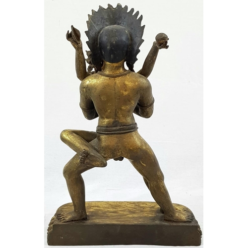 37 - An Early Tibetan Buddhist Gilded Bronze Fertility Statue. 40cm tall.