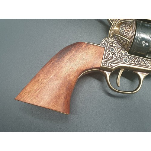 549 - Replica Colt 45. The Gun that won the West!
Fully Engraved 1869 Colt, with wooden handle. Dry firing... 