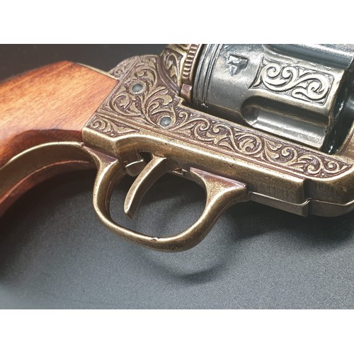 549 - Replica Colt 45. The Gun that won the West!
Fully Engraved 1869 Colt, with wooden handle. Dry firing... 