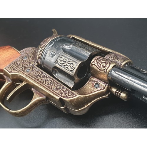 549 - Replica Colt 45. The Gun that won the West!
Fully Engraved 1869 Colt, with wooden handle. Dry firing... 