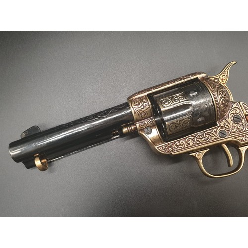 549 - Replica Colt 45. The Gun that won the West!
Fully Engraved 1869 Colt, with wooden handle. Dry firing... 